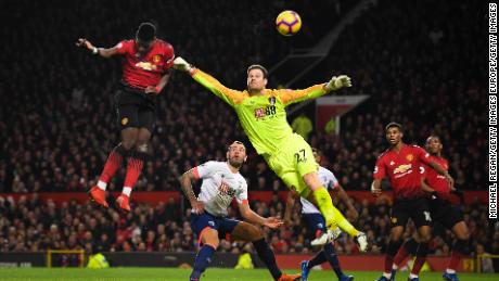 Manchester United&#39;s Paul Pogba beats Asmir Begovic of AFC Bournemouth as he scores the Red Devils&#39; second goal.