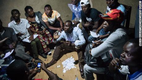 Improvised electoral agents count ballots after a symbolic vote on December 30, 2018, at Kalinda Stadium in Beni, where voting in the general election was postponed. 
