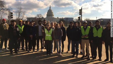   A group of young Muslims clean up national parks during the government's closure 