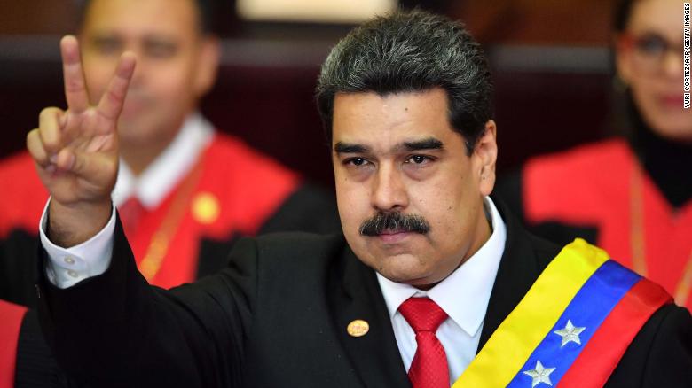 Venezuela's President Nicolas Maduro flashes a victory sign after being sworn in for his second term in Caracas on Thursday.