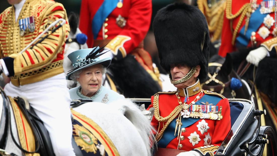 The Queen and Prince Philip attend the annual Trooping the Colour ceremony in June 2011.