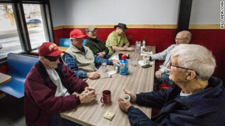   The Monticello Neighbors, in l Iowa, including Mel Manternach, second from left, gather at Darrell's Diner to debate the politics of the day. 