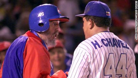 Castro talks with  Chavez before a friendly baseball game between the Cuban and Venezuelan teams, in Venezuela in 2000. 