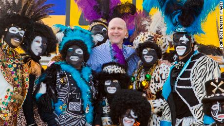 New Orleans Mayor Mitch Landrieu, center, and Zulu members pose in 2012 before the group&#39;s parade.