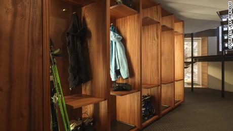 The ski lockers are made of sapele wood and brass.