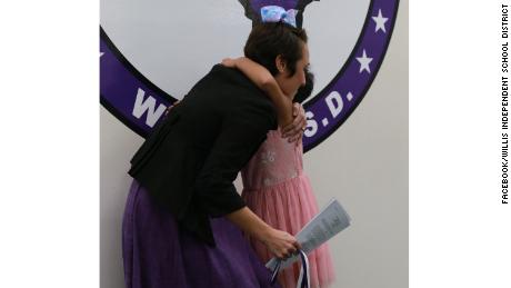 Prisilla kissed her teacher gratefully.