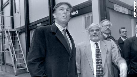 Trump (left) is accompanied to Moscow by real estate mogul Bennett LeBow (second from left).