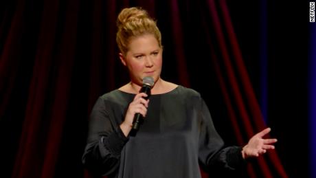 Amy Schumer appears on one of her Netflix specials. 