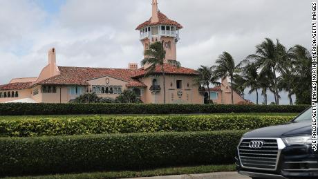 A woman accused of illegal entry to Mar-a-Lago had many electronic devices, thousands in cash