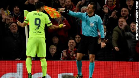 Luis Suarez contests an offside decision that was eventually overturned as Barcelona took the lead against Manchester United.