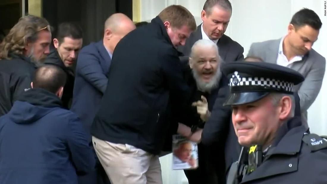 A screen grab from video footage shows the dramatic moment when Assange was &lt;a href=&quot;https://edition.cnn.com/2019/04/11/uk/julian-assange-arrested-gbr-intl/index.html&quot; target=&quot;_blank&quot;&gt;hauled out of the Ecuadorian Embassy by police&lt;/a&gt; in April 2019. Assange was arrested for &quot;failing to surrender to the court&quot; over a warrant issued in 2012. Officers made the initial move to detain Arrange after Ecuador withdrew his asylum and invited authorities into the embassy, citing his bad behavior.