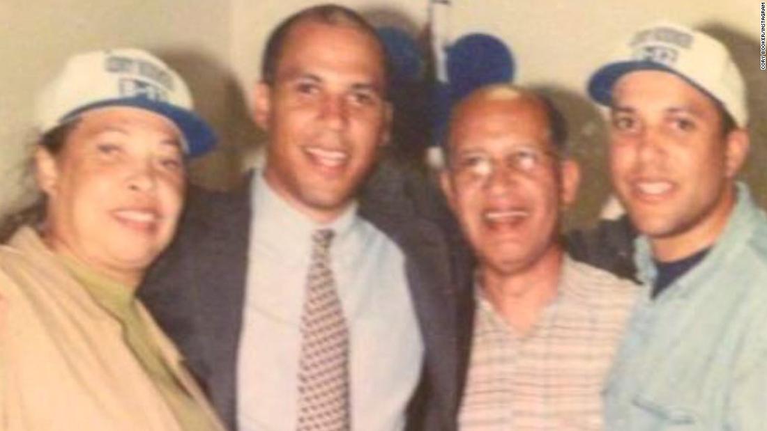 Booker, second from left, poses with his parents and his brother after he was elected to the Municipal Council of Newark in 1998. It was his first public office.