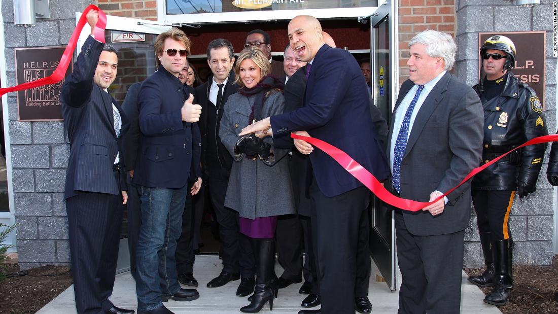 Booker helps cut the ribbon at the opening of affordable housing in Newark that was funded through Jon Bon Jovi&#39;s JBJ Soul Foundation in December 2009.
