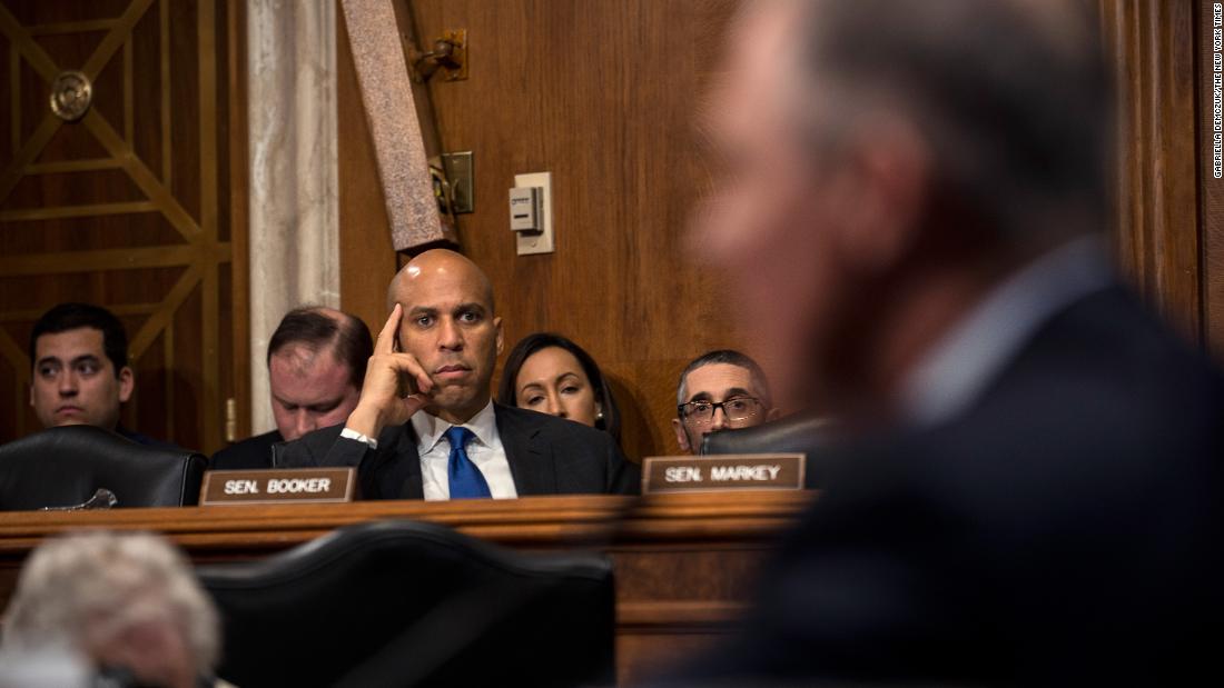 Booker looks on as Scott Pruitt, Oklahoma&#39;s attorney general and Donald Trump&#39;s pick to run the Environmental Protection Agency, testifies at his confirmation hearing in January 2017.