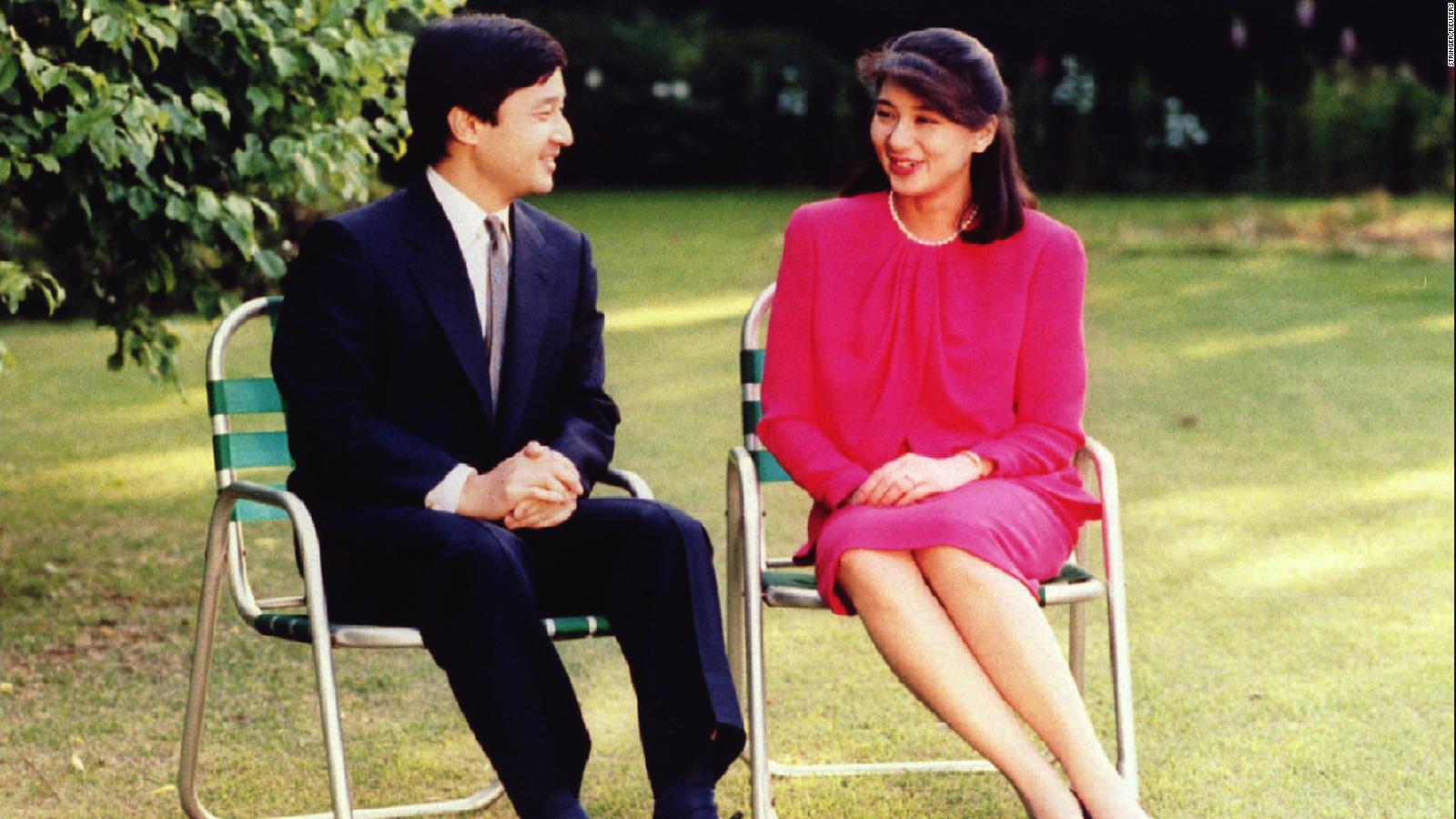 Japan's Crown Prince Naruhito chats with his then-fiancee Masako Owada, former career diplomat, in the garden of Togu Palace in Tokyo ahead of their 1993 wedding.