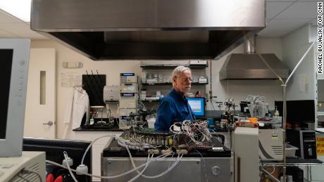 Davis at the Stanford Genome Technology Center, where his son's blood samples are mixed in sequencing machines.