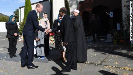 Prince William greets members of the Muslim community as he arrives at the Al Noor mosque Friday.