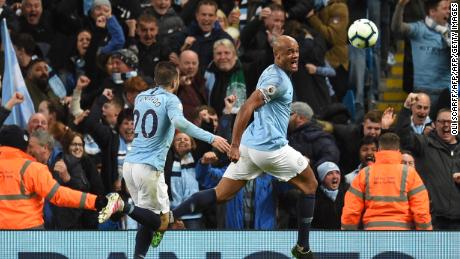Vincent Kompany celebrates scoring the winning goal against Leicester City.