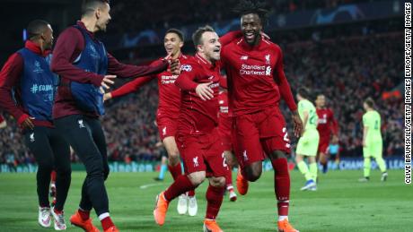 Divock Origi of Liverpool celebrates as he scores during UEFA Champions League game against Barcelona. 