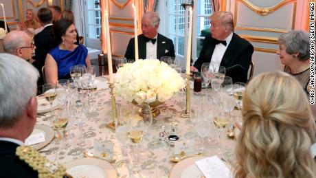 White House press secretary, Sarah Huckabee Sanders (2L), British Prince Charles Charles, Prince of Wales (C), US President Donald Trump (2R) and British Prime Minister Theresa May at a dinner at Winfield House, the residence of the US ambassador, where US President Trump is staying in London on June 4, 2019, the second day of his three-day state visit to the United Kingdom.