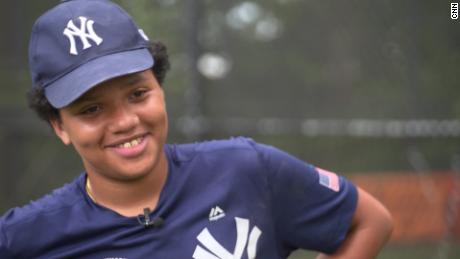 12-year-old Michael Pena plays in a Little League that honors fallen NYPD officers