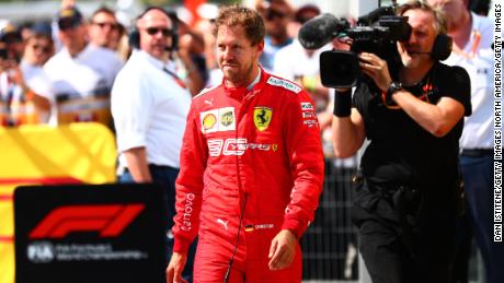 MONTREAL, QC - JUNE 09:  Sebastian Vettel of Germany and Ferrari walks in to parc ferme to swap the 1st and 2nd place boards after the F1 Grand Prix of Canada at Circuit Gilles Villeneuve on June 9, 2019 in Montreal, Canada.  (Photo by Dan Istitene/Getty Images)