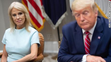 President of the United States, Donald Trump, alongside Kellyanne Conway (left), adviser to the President, at a meeting on the opioid epidemic in the Roosevelt Hall of the White House in Washington, on June 12, 2019.