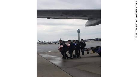 Lord's coffin is taken from the plane to Cleveland on the way to his hometown, northeast of Ohio.