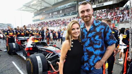 Geri poses with singer Sam Smith at the Abu Dhabi Grand Prix Formula 1 in 2018.