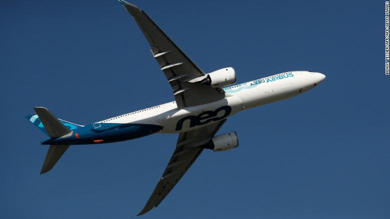 An Airbus A330neo aircraft flies during the inauguration of the 53rd International Paris Air Show at Le Bourget Airport near Paris, on June 17, 2019. (Photo by BENOIT TESSIER / POOL / AFP)