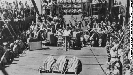 A funeral is held at sea for three US Marines killed in the Battle of Tarawa.