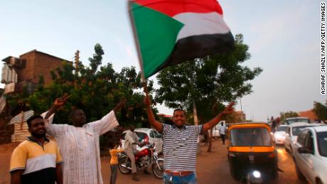Sudanese protestors celebrate in the streets of Khartoum.