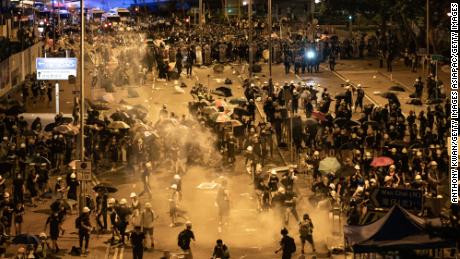 Police fire tear gas at protesters outside the Legislative Council Complex in the early hours of July 2, 2019 in Hong Kong, China. 