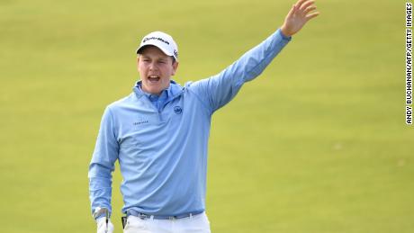 Scotland&#39;s Robert MacIntyre reacts after playing a shot on the 1st hole during the third round of the British Open golf Championships at Royal Portrush golf club in Northern Ireland on July 20, 2019. (Photo by Andy BUCHANAN / AFP) / RESTRICTED TO EDITORIAL USE        (Photo credit should read ANDY BUCHANAN/AFP/Getty Images)
