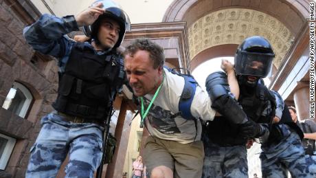 Hundreds of protesters were detained at an opposition election demonstration in Moscow on Saturday.
