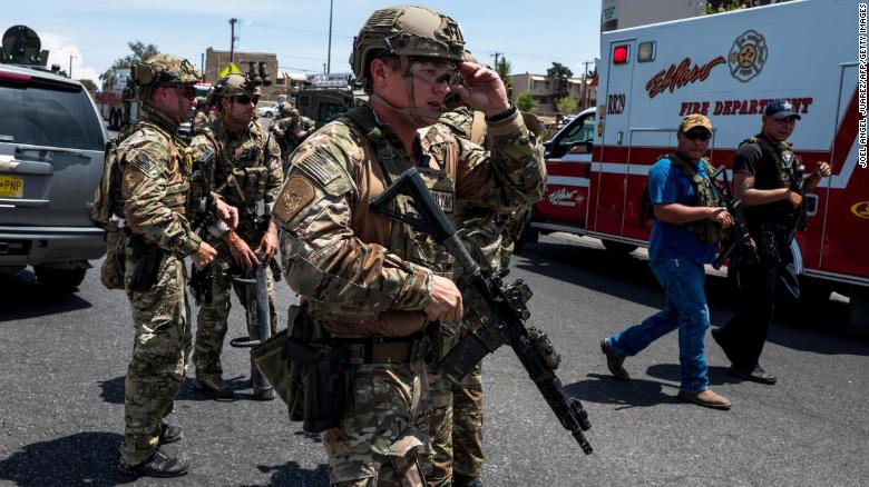 Law enforcement agencies respond to an active shooter at a Wal-Mart near Cielo Vista Mall in El Paso, Texas, Saturday, Aug. 3, 2019.