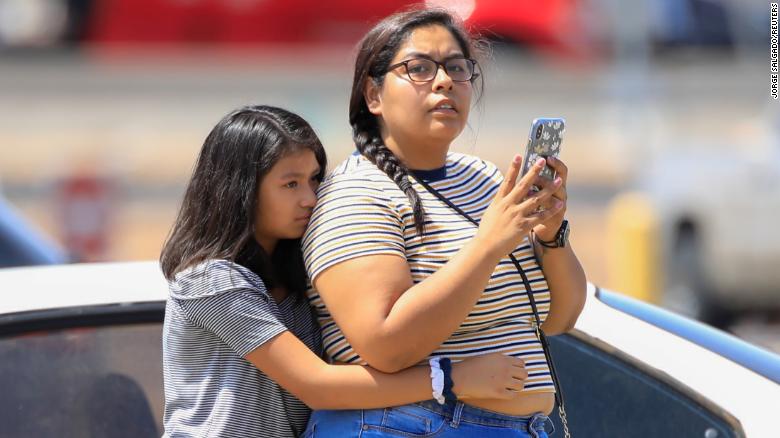 A girl reacts after a mass shooting at a Walmart in El Paso, Texas, U.S. August 3, 2019. 