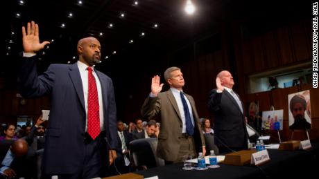 Roy Austin, left, appears in Congress during his time with the Obama administration. He remains frustrated at the nation&#39;s approach to hate crimes.