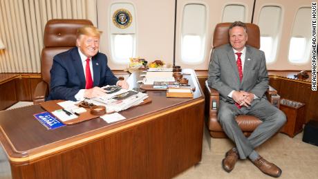 Alaska Governor Mike Dunleavy met President Trump on Air Force One on June 26 as the president's plane was on the tarmac in Alaska en route to the G20 summit in Japan.