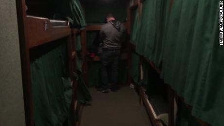 Images from a 2018 video aboard the Design show beds separated by curtains. 