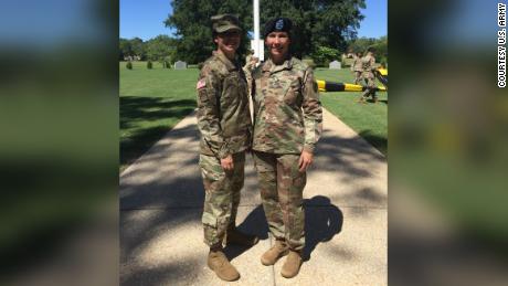 Maj. Gen. Maria Barrett and her sister, Brig. Gen. Paula Lodi, pose for a family photo after then Col. Lodi&#39;s outgoing Change of Command for the 44th Medical Brigade, Fort Bragg, N.C. in July 2018.
