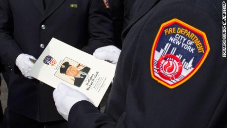 Members of the New York Fire Department attend Tuesday the funeral of FDNY firefighter Michael Haub in New York. 