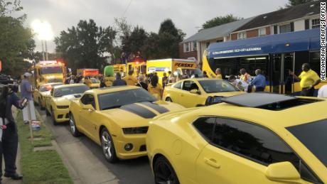 A view of the street with all yellow vehicles.