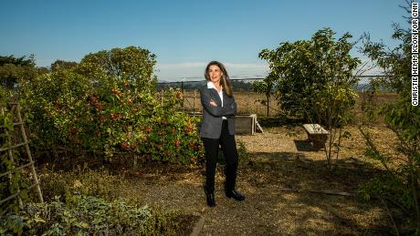 Sweet Earth President, Kelly Swette, in the Garden of Employees at Sweet Earth Headquarters.