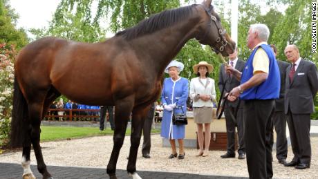KILDARE, IRELAND - MAY 19:  Queen Elizabeth II and Prince Philip, Duke of Edinburgh during a visit to the Irish National Stud, one of Ireland&#39;s top horsebreeding centres, during the third day of the state visit to Ireland, on May 19, 2011 in Kildare, Ireland. The Duke and Queen&#39;s visit to Ireland is the first by a monarch since 1911. An unprecedented security operation is taking place with much of the centre of Dublin turning into a car free zone. Republican dissident groups have made it clear they are intent on disrupting proceedings.  (Photo by John Stillwell - Pool/Getty Images)