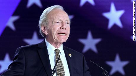In this July 13, 2019, file photo, former Sen. Joe Lieberman speaks during a conference in the Albanian town of Manza. 