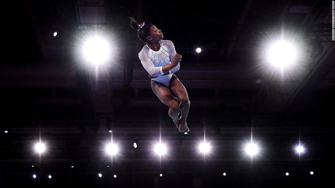 Simone Biles competes in the floor exercise during the World Championships in Stuttgart, Germany, in October 2019.