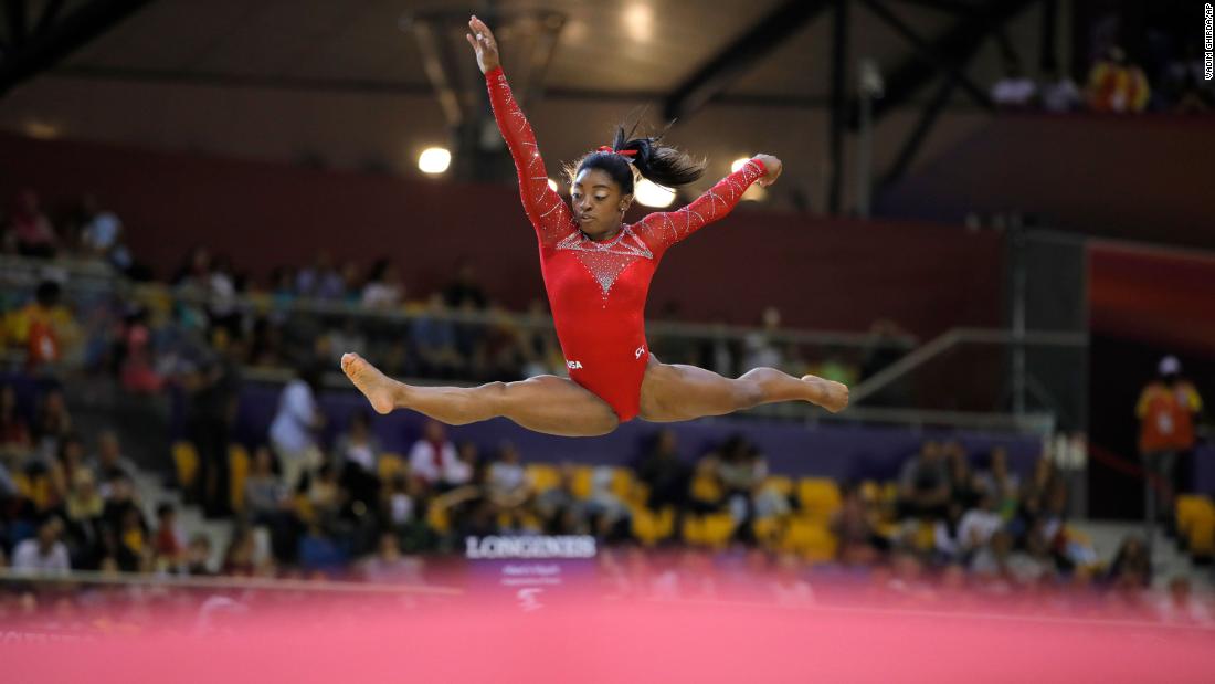Biles performs on the floor during the 2018 World Championships.