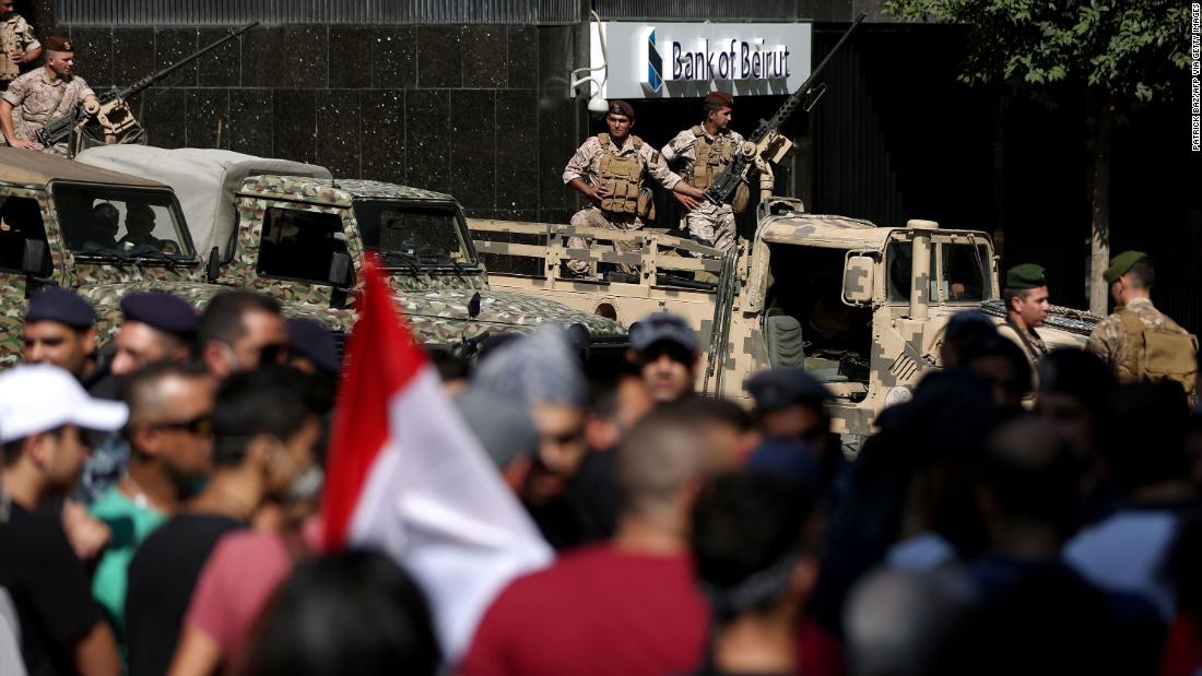 Lebanese soldiers stand guard in Beirut&#39;s financial district on October 19.