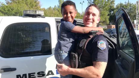 Officer Randolph &quot;Scott&quot; Valdez and 5-year-old Charlie Skabelund together after Officer Valdez responded to Charlie&#39;s 911 call asking for a McDonald&#39;s Happy Meal.